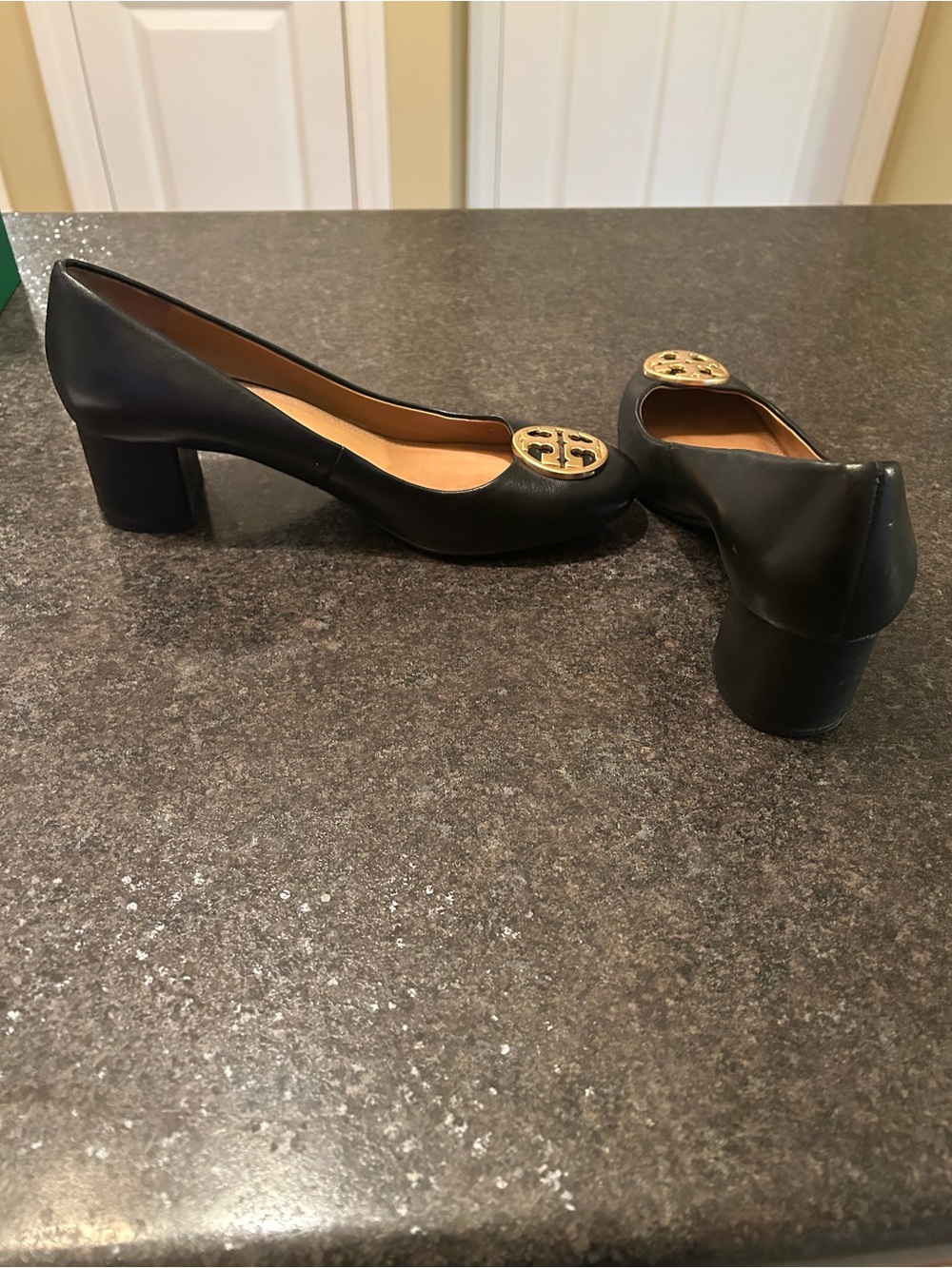 Tory Burch Black Leather Block Heel Pumps with Gold Logo Medallion